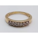 9CT YELLOW GOLD DIAMOND SET BAND RING WITH 0.25CT DIAMOND, WEIGHT 2G AND SIZE L