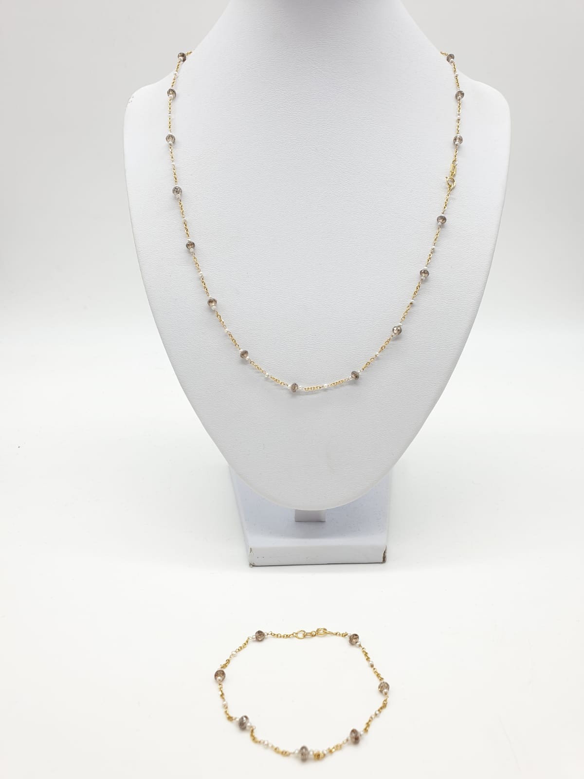 14ct gold brown diamond and pearl necklace with matching bracelet, total weight 5.6g and over 9ct