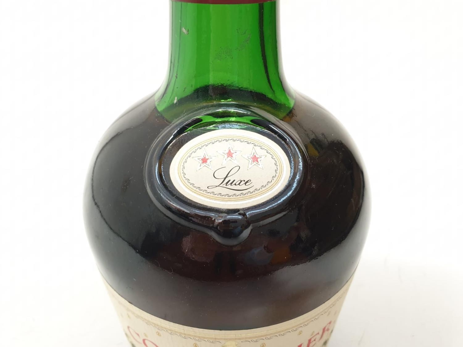 A bottle of vintage Courvoisier cognac. - Image 5 of 8