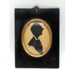 A George III silhouette in a black wood frame. 14cm x 19cm.