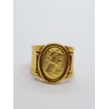 18ct yellow gold vintage ring with a lady portrait centre, weight 5.7g and size M