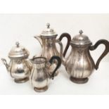 An antique coffee and tea set. Includes coffee and teapot, cream jug and sugar bowl. French marks,