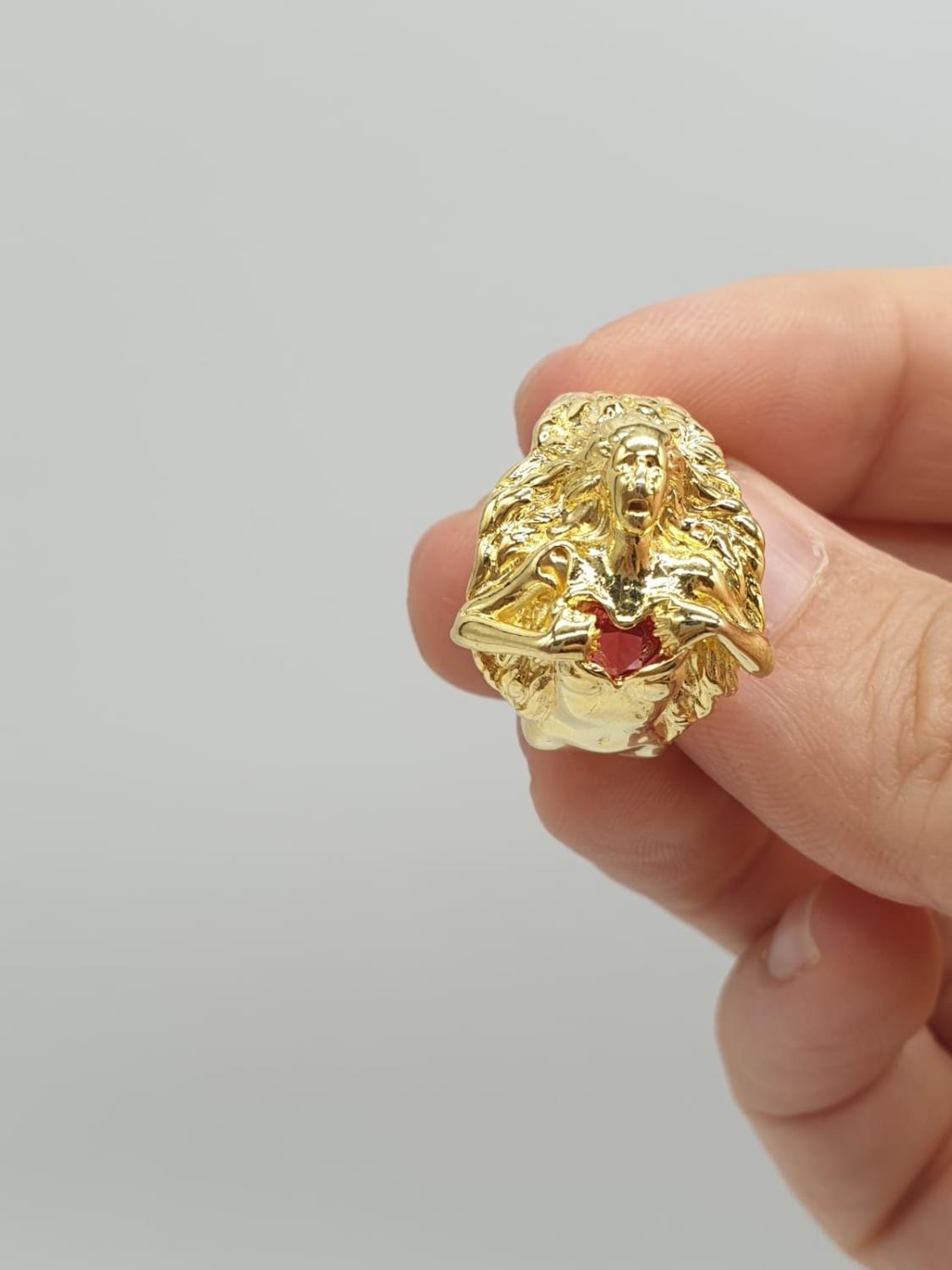 An unusual silver (stamped 925) and gold filled ring depicting a lady offering her heart. Ring size: - Image 2 of 4