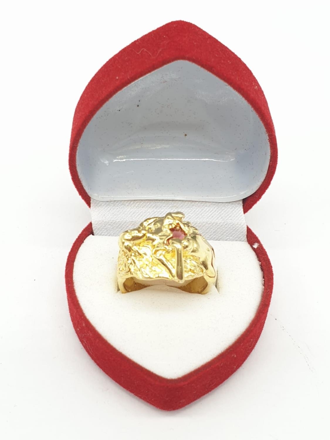 An unusual silver (stamped 925) and gold filled ring depicting a lady offering her heart. Ring size: - Image 3 of 4