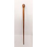 Gentleman's antique walking stick, with brass studs on the holder and a brass tip-end, 88cm long