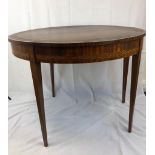 A late Victorian Semi circular table that opens up into a card table with leather top, nicely inlaid
