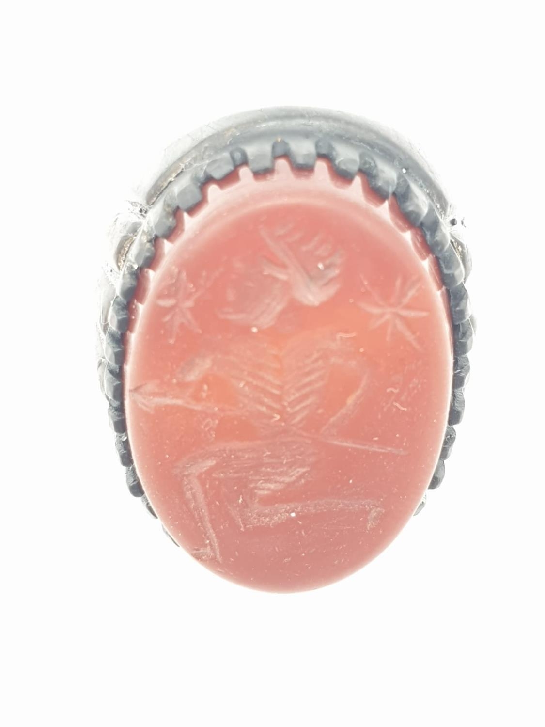 A Roman-Thracian silver ring with a carved carnelian seal depicting a soldier with a spear. The ring - Image 5 of 7