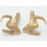 Yellow metal pelican cufflinks