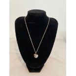 Silver apple of temptation pendant mounted on extra long silver chain 925 silver. Pendant opens to