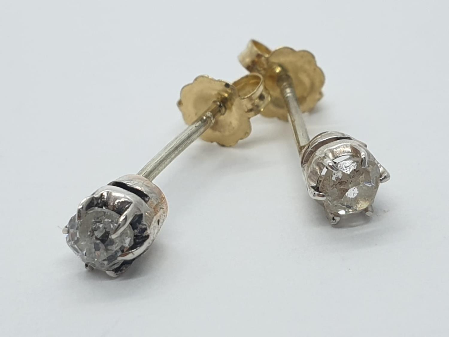 Pair of Diamond STUD EARRINGS.