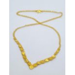 22ct yellow gold heart decorated necklace, weight 6.8g and 42cm long approx