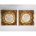 A pair of Enrico Bragan styled alabaster reliefs of cherubic children. Beautiful gilt frame, and