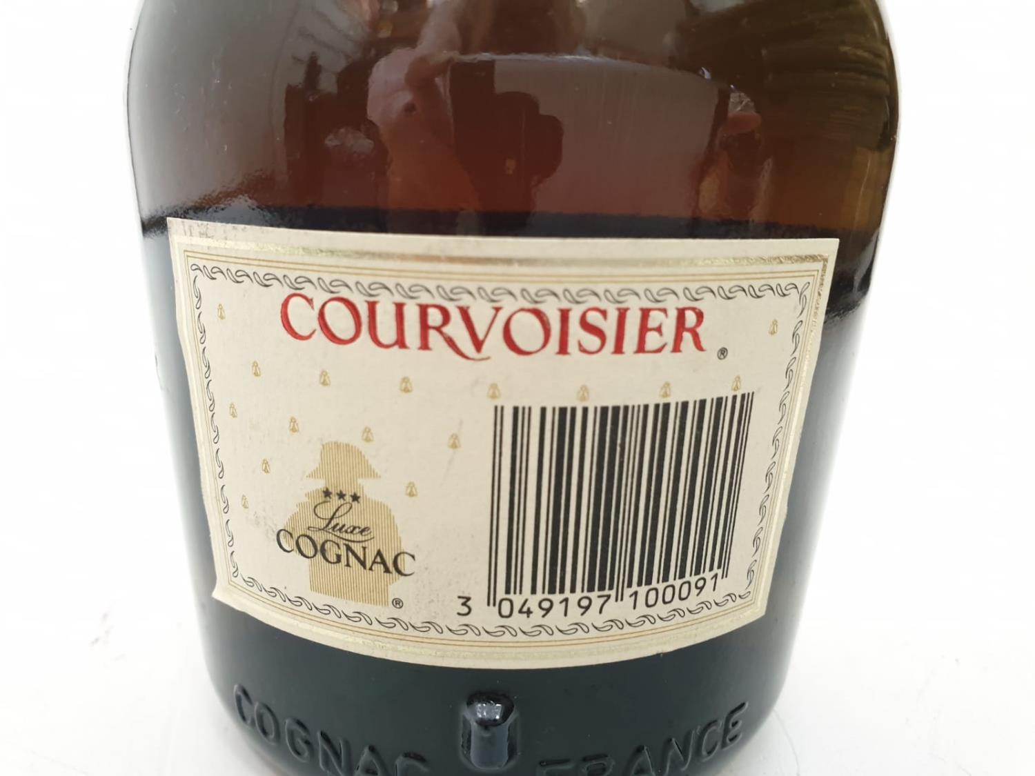 A bottle of vintage Courvoisier cognac. - Image 7 of 8