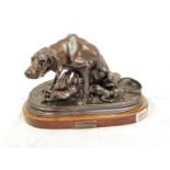 A stunning bronze veritable sculpture of a dog feeding its pups. Made by the sculptor R.S Gerdon.