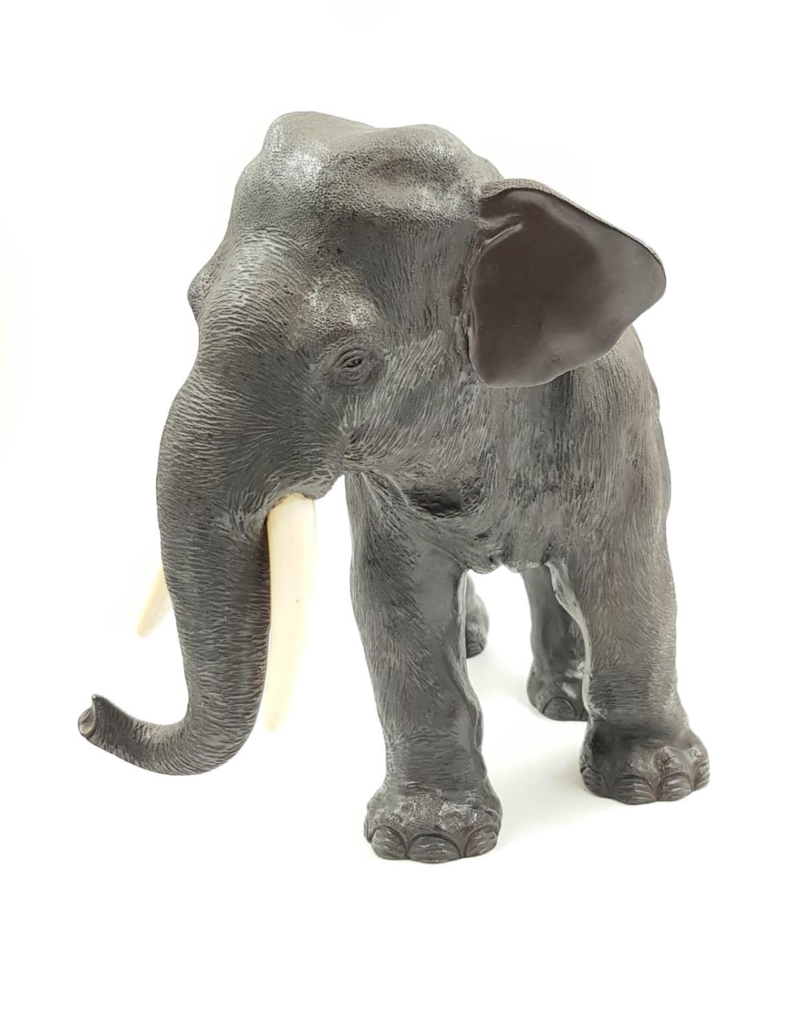 A beautiful bronze elephant sculpture (circa 1930) with ivory tusks, Japanese marked possibly Seya - Image 4 of 5