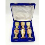 A set of six Onyx stone egg cups in a beautiful presentation case. 20 x 20cm.