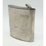 A pewter vintage hip flask made by the Alchemy company in Sheffield. 7x9cm.
