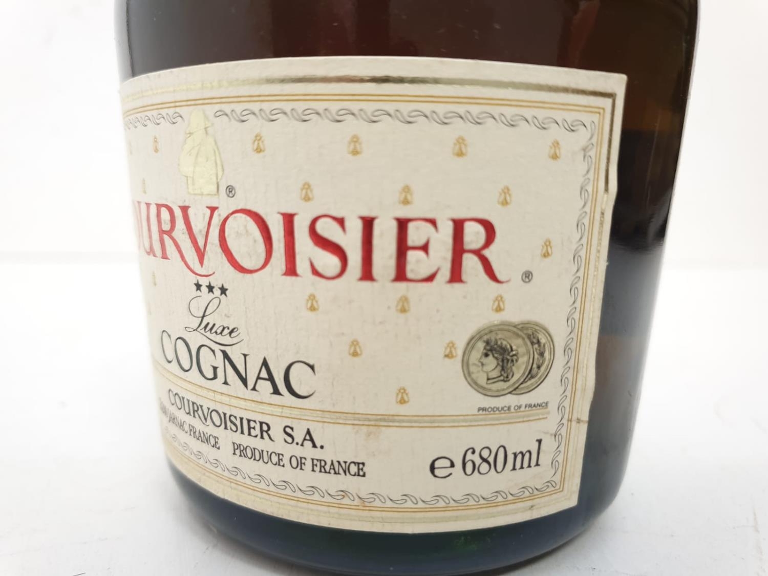 A bottle of vintage Courvoisier cognac. - Image 4 of 8