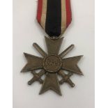 German WW11 merit MEDAL with crossed swords. Dated 1939.