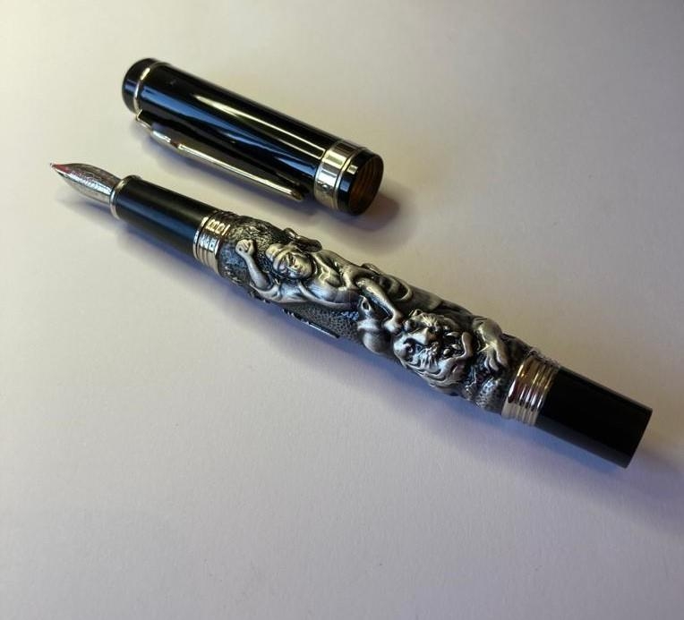 Jinhao fountain pen in black with tiger detail in relief. Having 18ct gold plated nib. Perfect - Image 2 of 2