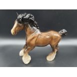 A large Beswick Shire Horse figurine standing at 22cm in height. Good condition, no visible