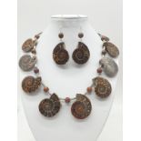 An unusual necklace and earrings set with Jurassic Ammonites (163 million years old) from