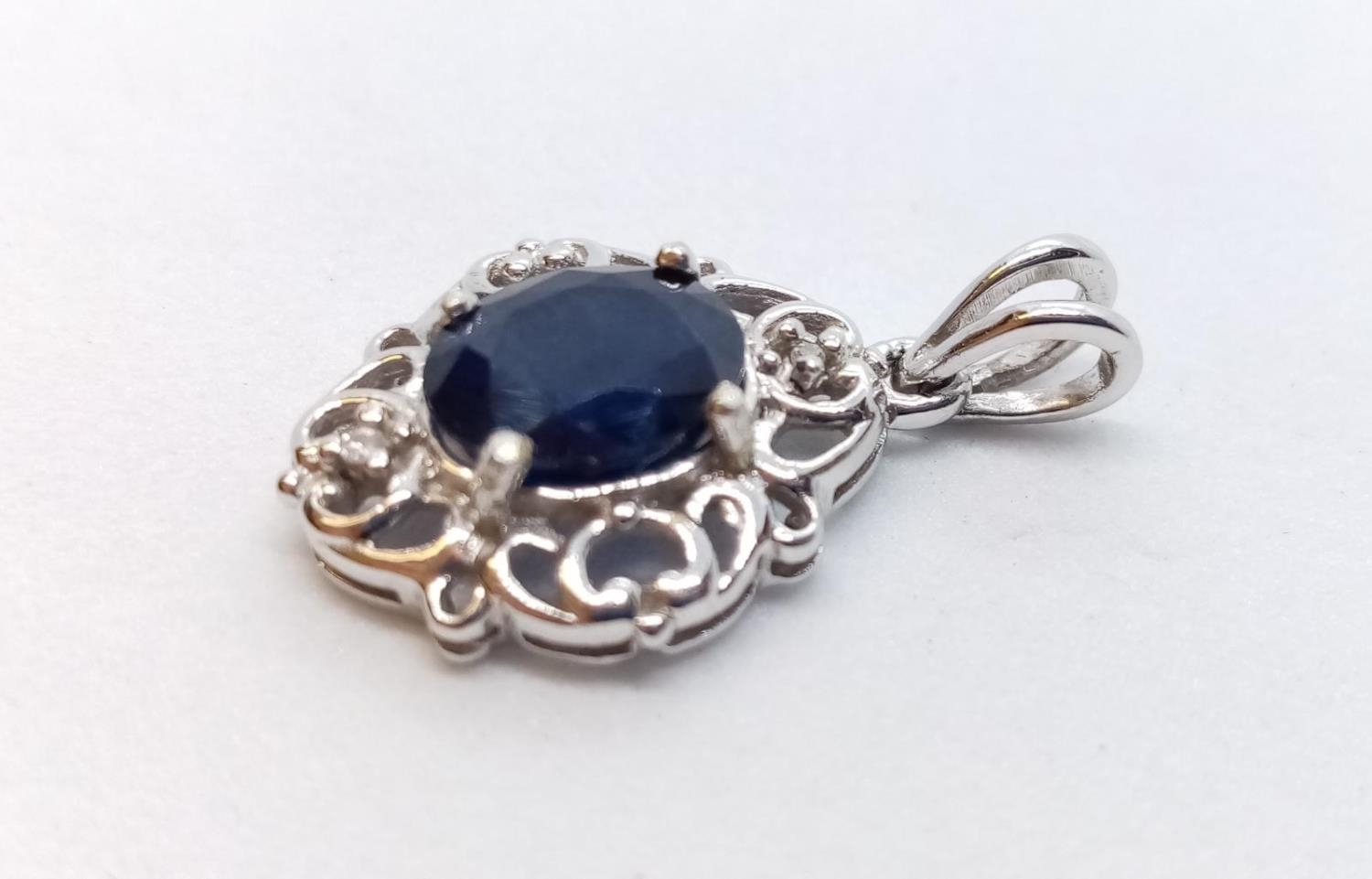 9ct White Gold Diamond and Sapphire PENDANT. 2.3g - Image 2 of 4
