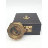 World War II boxed compass made in 1941 for The Royal Navy by Henry Hughes & Sons Ltd. Box 8x8cm.