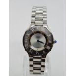 Must de Cartier Ladies WATCH with round face and Roman Numerals. 28mm case.