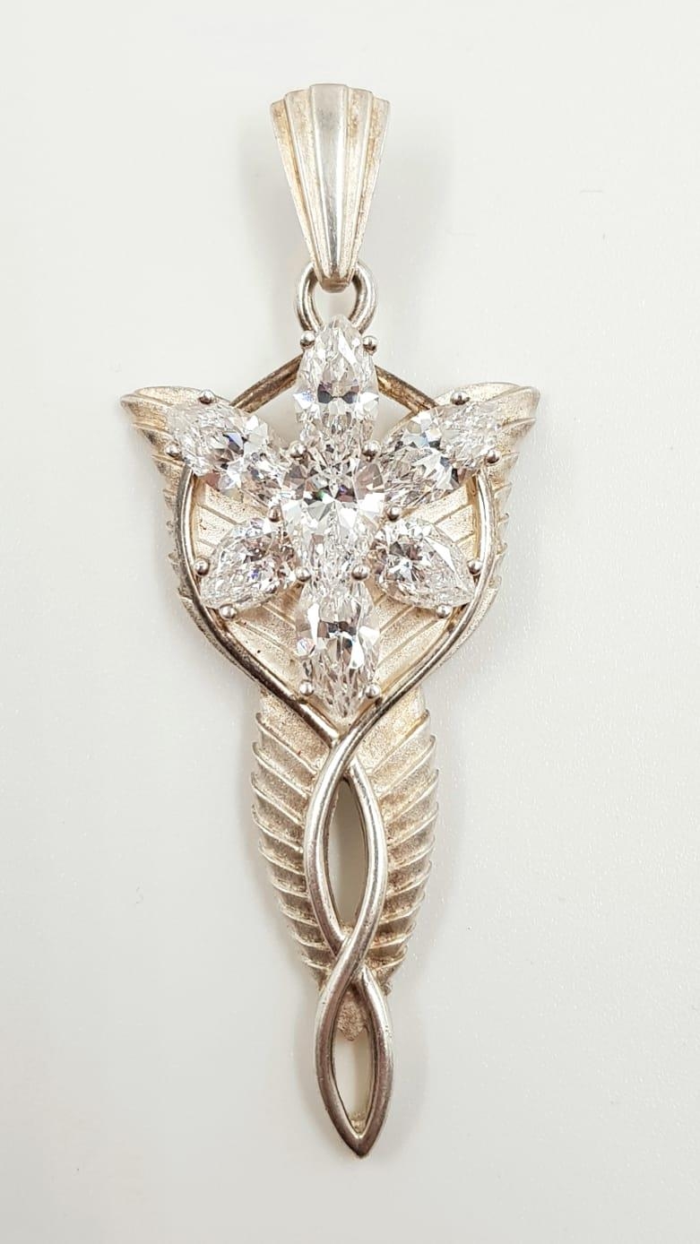 A silver and diamond-like pendant. 13.5g total weight and 5cm length. - Image 2 of 3