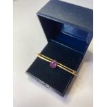 9ct gold and amethyst bar brooch. As found. 4.75cm in length. 1.9 grams in weight.