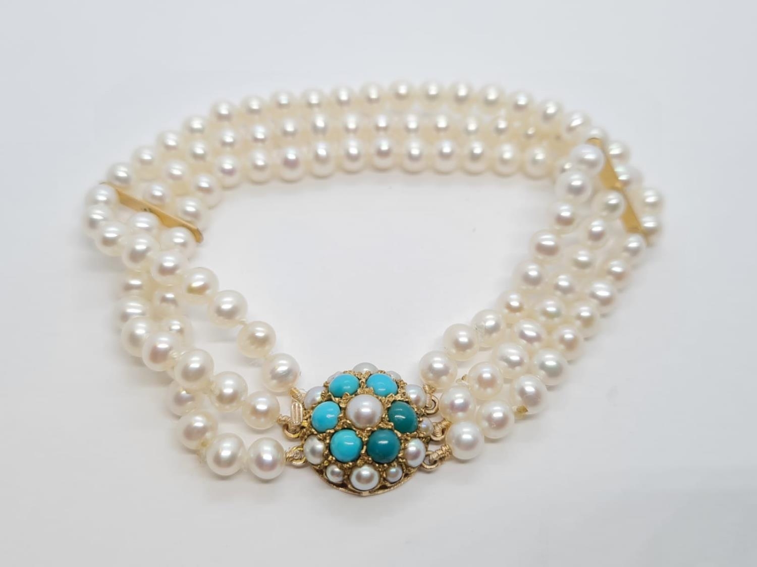 Triple row of Pearls BRACELET with a Turquoise and 9ct Gold Clasp . 72.2g