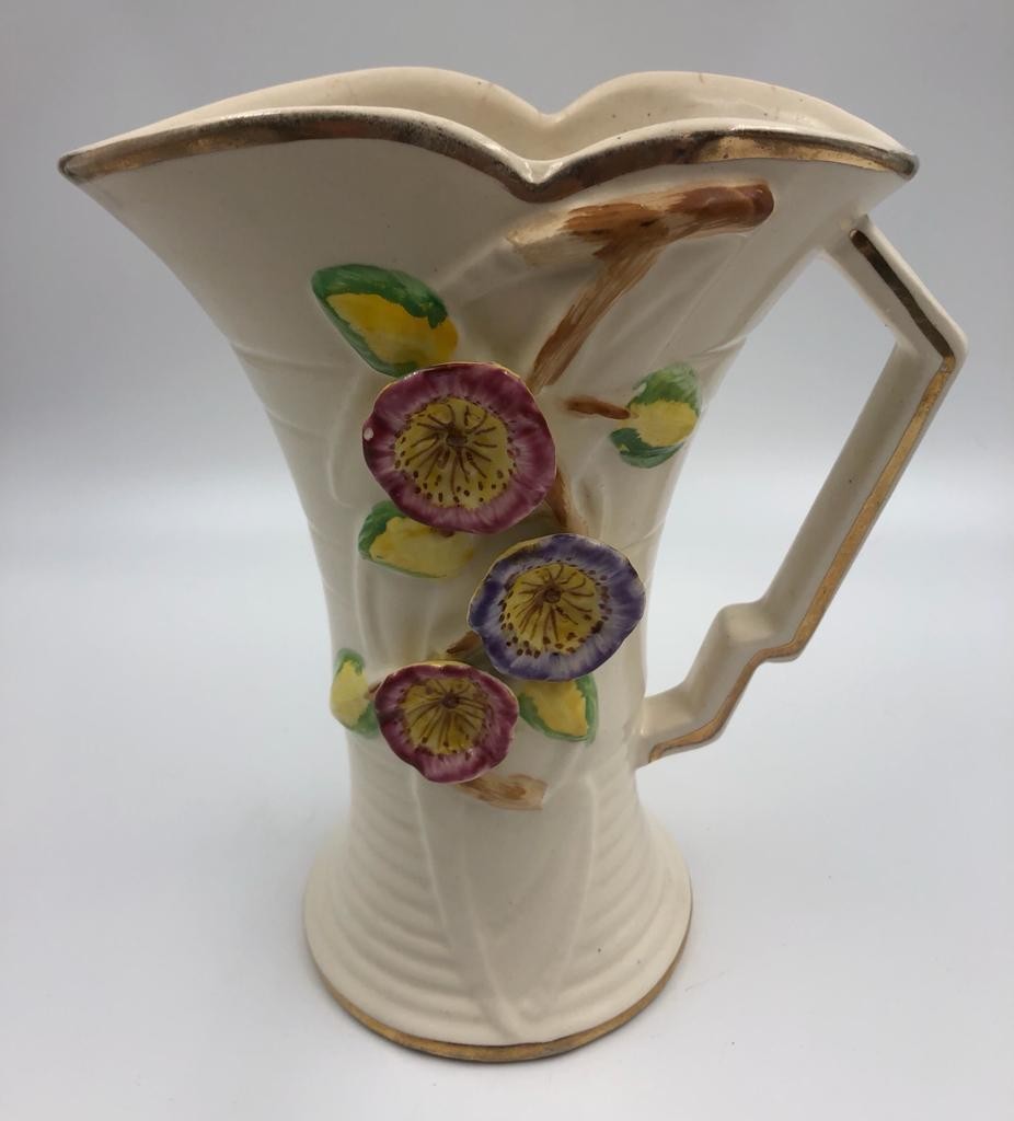 An Arthur Wood ceramic vase with decorative flower pattern, 20cm tall