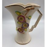 An Arthur Wood ceramic vase with decorative flower pattern, 20cm tall