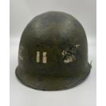 WW2 Front Seam Swivel Bale US M1 Helmet made by Schlueter. The batch number on the rim dates it as