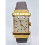 Patek Philippe Geneve WATCH tank style with rectangular face Case: 20x40mm. Brown Leather Strap.