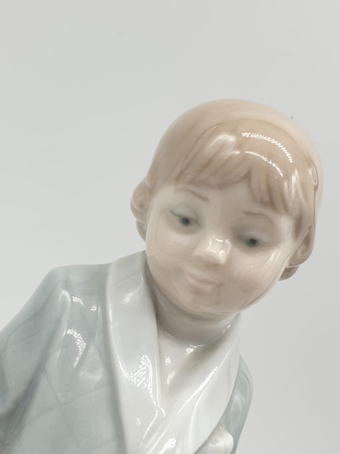 Lladro boy in dressing gown. 21cm tall. - Image 2 of 6