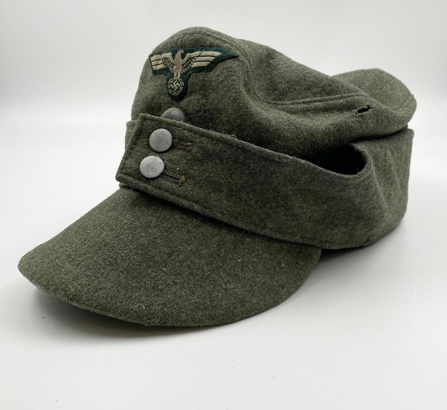 Ersatz (economy issue) Waffen SS M43 Cap. This is a standard Heer (Army) cap that has a panzer