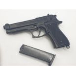 Replica Beretta automatic pistol as used by the U.S military. Cocking and dry firing action with