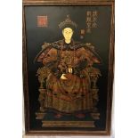 An antique embossed painting of the Emperor Qianlong in court robes, original wood gilded frame,