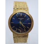 Vintage Patek Philippe Geneve Gents WATCH with blue face and solid Gold strap. Rear winder.