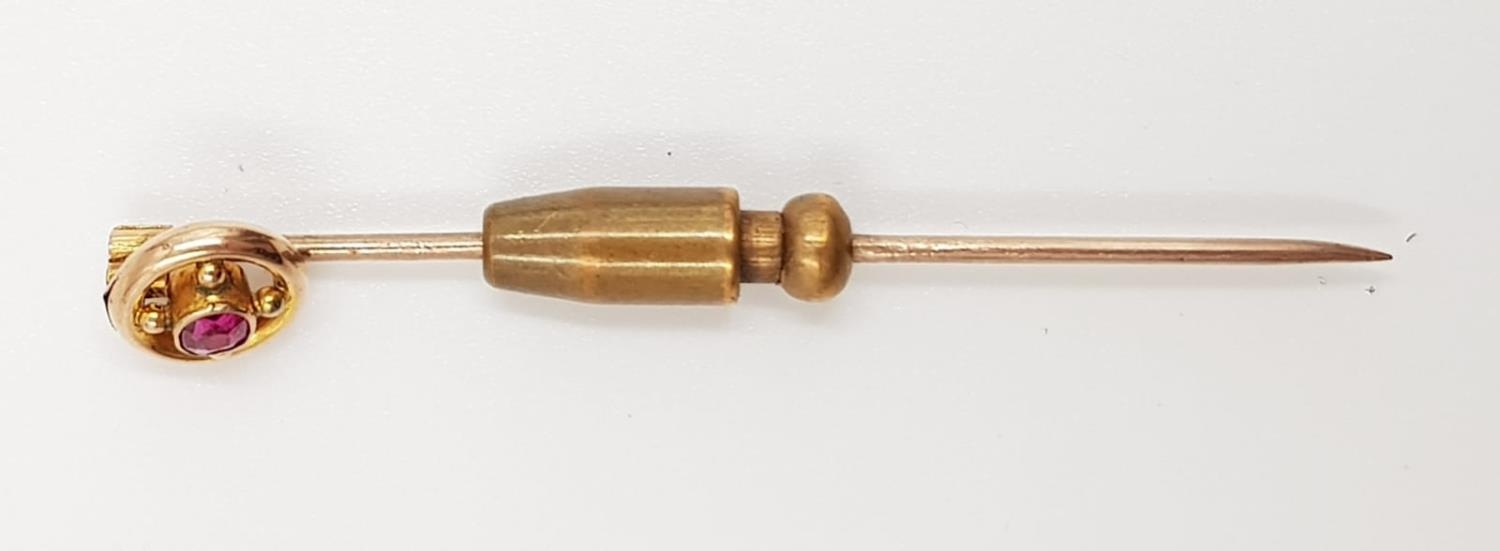 A 9ct gold stick pin; with small ruby. Weighs 2.4g and is 5cm. - Image 2 of 3