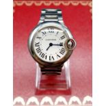 Cartier Stainless Steel Ladies WATCH with Roman Numerals and white face. Stainless Steel Strap.