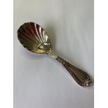 Early Victorian silver caddy spoon having a bowl in shell form and beadwork to handle. Hallmark