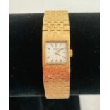 Vintage ladies Rotary gold tone wristwatch having integrated gold plated brickwork strap. Working