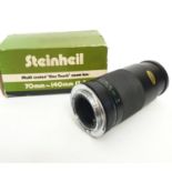 A Steinheil multi coated 'one touch' zoom lens. 70mm - 140mm. Good condition.