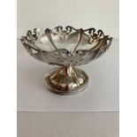 Antique Silver BON BON DISH, having raised bowl with pierced scroll work on the edge, sitting on a 6