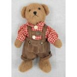 A Vintage, plush German Teddy Bear, wearing vinyl lederhosen. 25cm.