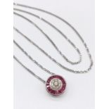 Diamond and Ruby circular PENDANT on a 9ct White Gold CHAIN. 5.4g 54cm chain