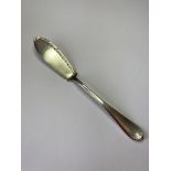 Antique Silver Butter Knife having chased ornate engraving to edge of Blade and Handle. Clear